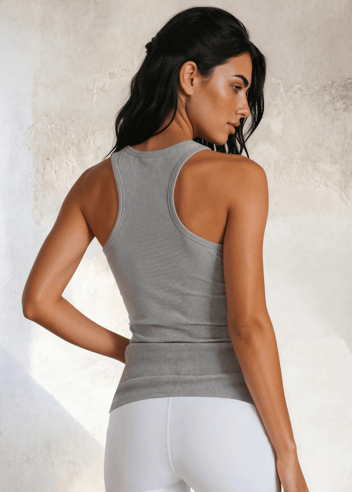 The Bra30 Tummy Tucker is an extra-long extra supportive racerback tank top that comfortably helps smooth out those unwanted lumps and bumps.  Chocolate Brown , Made in USA