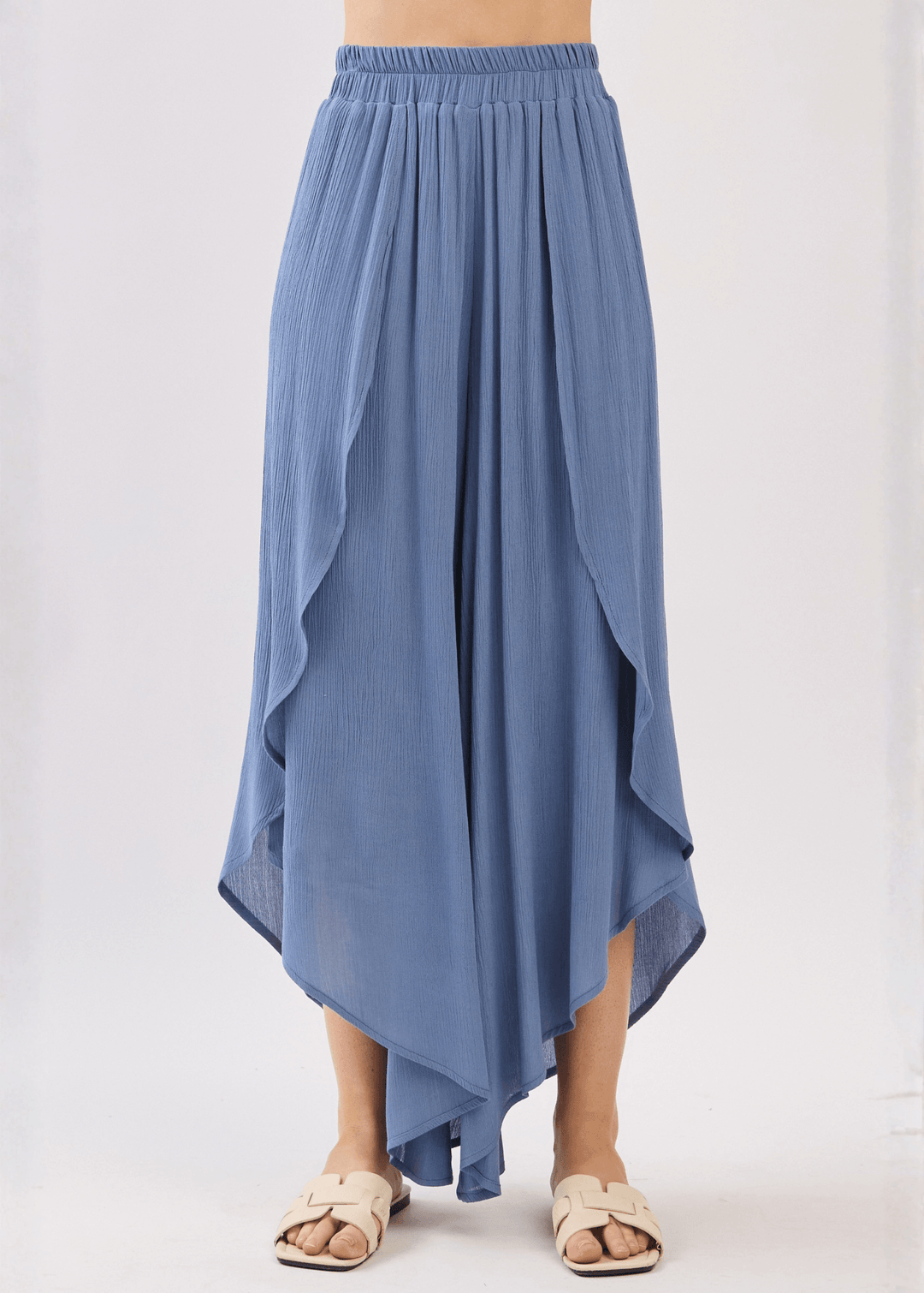 Breezy Denim Blue flowy pants with elastic waist & overlap split leg detail. Lightweight 100% rayon. Made in USA. Perfect for vacation & resort wear.