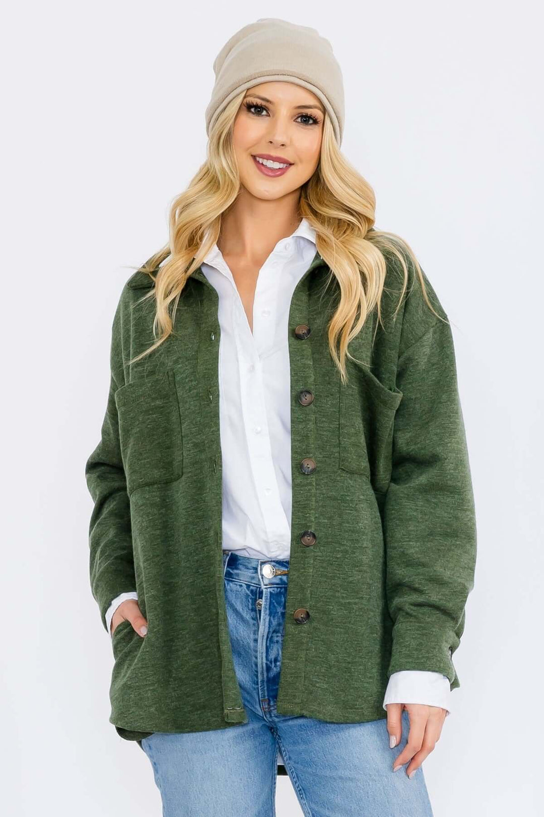 Made in USA button-down shacket with a relaxed fit, side pockets, and a medium-weight feel. Layer in Charcoal Black or Olive, sizes S–L
