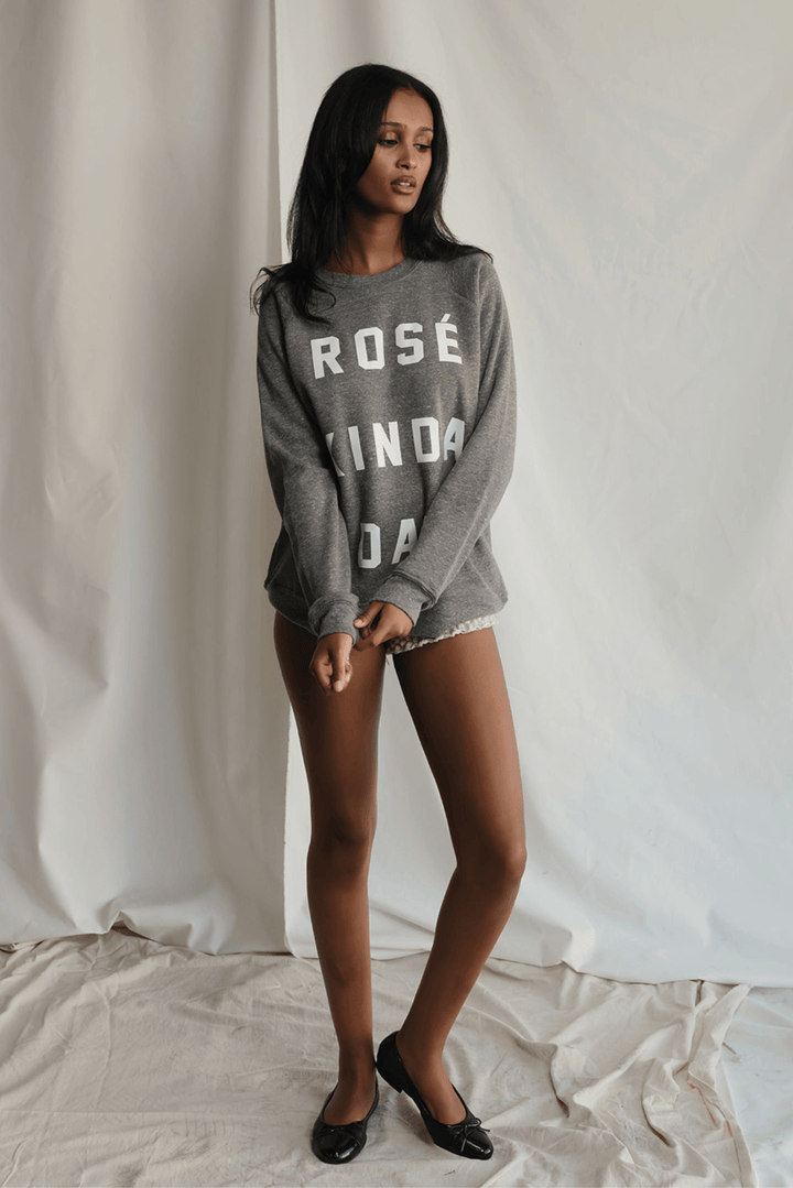 Warning: May induce day-drinking fantasies. This heather grey sweatshirt isn&