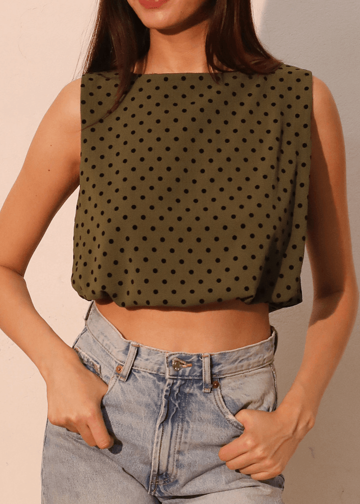 Elevate your casual wardrobe with this charming Flocked Polka Dot Bubble Crop Top. Crafted in USA from luxurious flocked satin in dark olive green with contrasting black dots, this sleeveless style features a soft elastic hem for a comfortable, flattering fit.