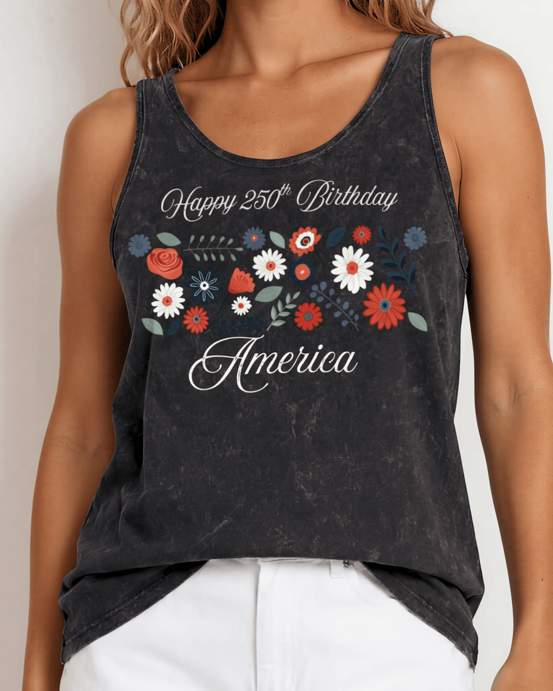 Celebrate July 4th in a USA-made, USA cotton-grown floral graphic tank top. Black mineral wash, relaxed fit, soft & stretchy. Proudly made in America.
