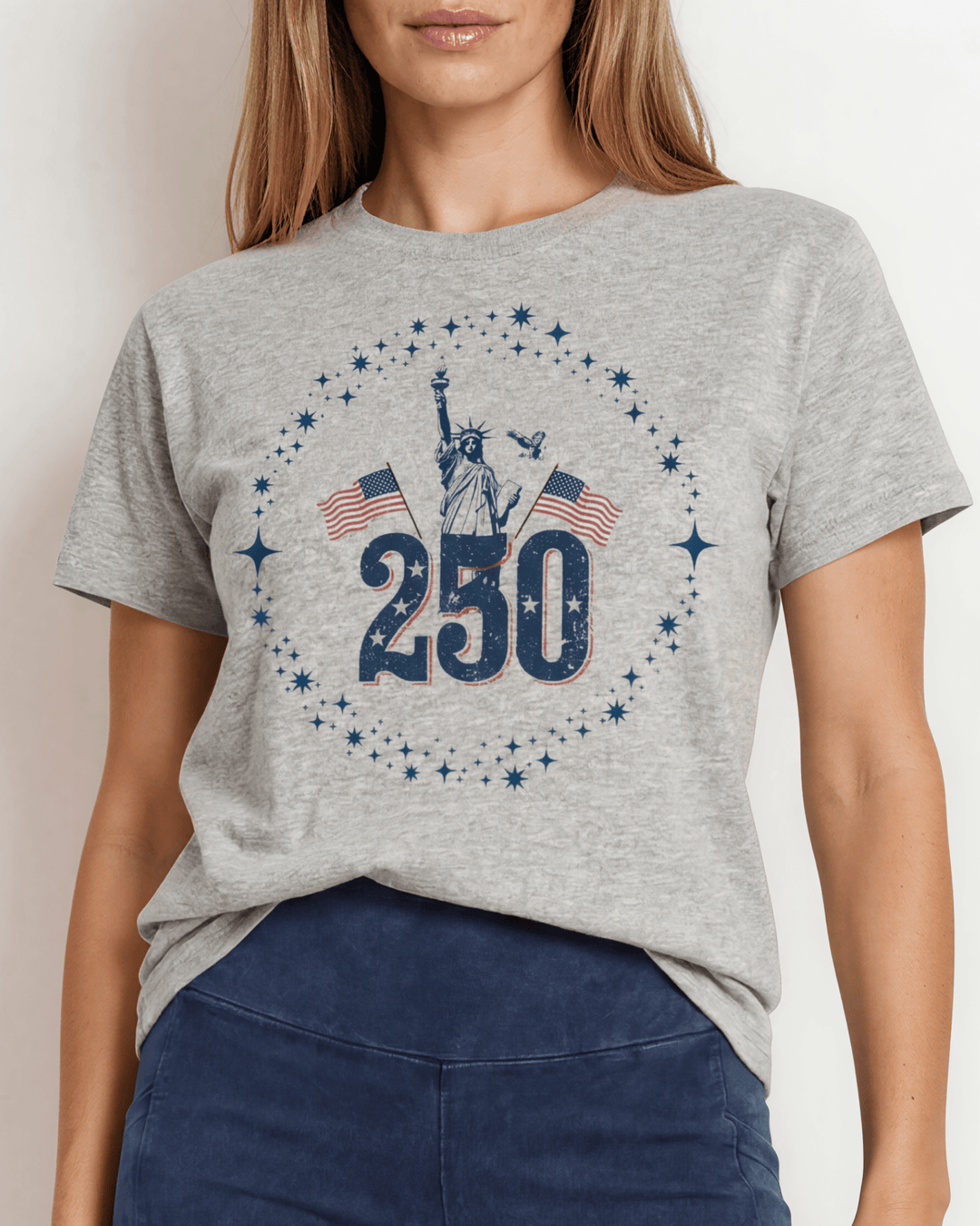 250 Statue of Liberty Patriotic Graphic Tee — Made in USA. Lady Liberty & American flags on heather gray, 100% cotton, relaxed fit. Perfect for 4th of July.