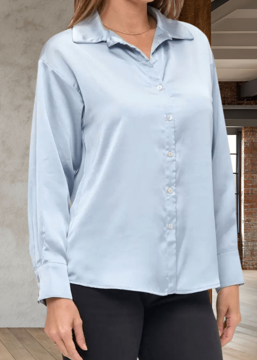 The Laura Satin Button Down Shirt in Steele Blue offers a refined blend of style and comfort. Made in the USA with 97% polyester and 3% spandex, this satin shirt features long sleeves, a classic collar, and a button-front closure for a polished look | Renee C. Style 5177TPA