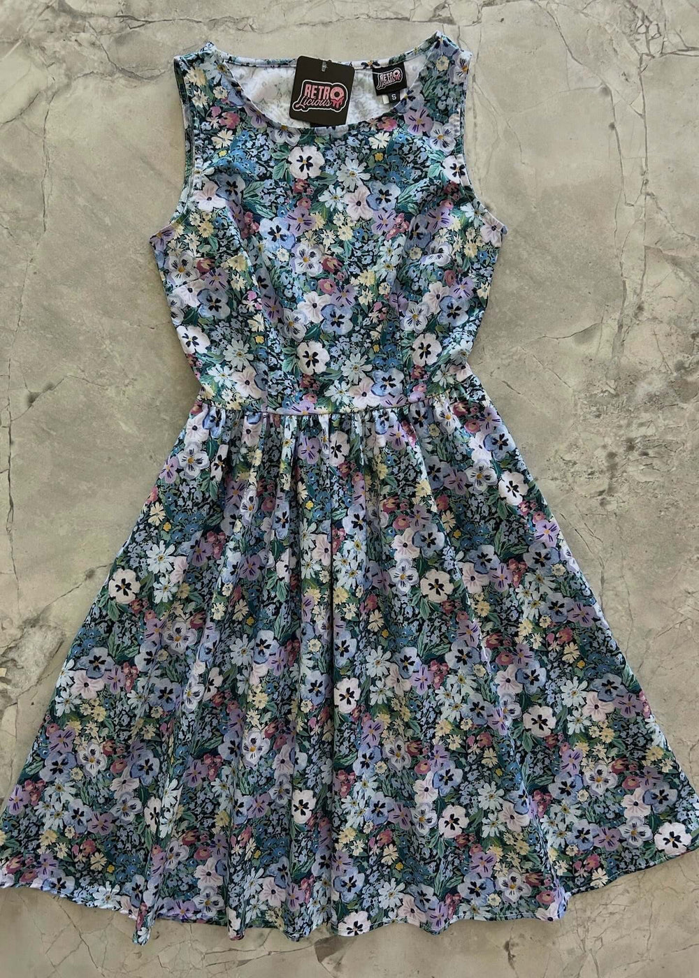 Made in USA, A women's vintage style piece with fun, modern details; our midi dress is now available in floral print. Made from 100% cotton