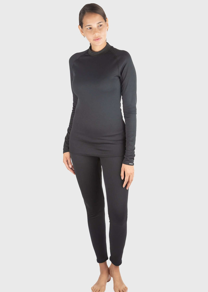 Experience unmatched warmth and comfort with the HEATR® Tundra Base Layer pant—our top-selling choice for lightweight, effective insulation. Designed without a women’s cut, this thin, flexible layer easily fits under any outfit, providing consistent heat from 0° to 75° F. The HEATR® technology integrated throughout the pant supports muscle recovery while keeping you dry and cozy during all your outdoor winter activities. Featuring an exposed waistband for added comfort, these base layer pants are ideal for 