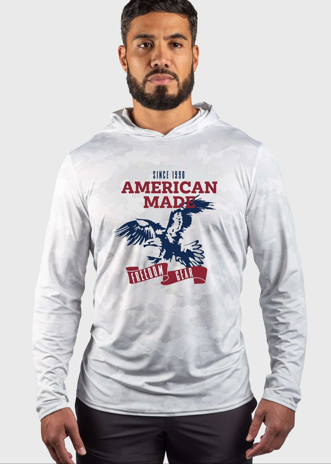 Experience superior comfort and protection with the American Made Eagle Mesh White Out Sun Hoodie. Crafted with performance mesh, this hoodie enhances breathability for optimal ventilation. Its built-in UPF 50 offers reliable sun protection, making it ideal for outdoor activities. Proudly made in the USA since 1990, it reflects quality craftsmanship and durability you can trust. This unisex design combines functionality with classic American manufacturing standards, perfect for staying cool and shielded und
