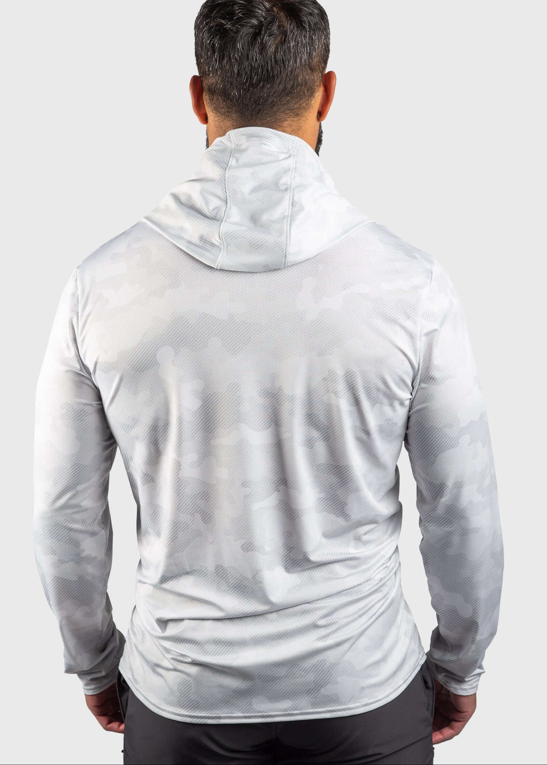 Stay comfortable and protected in the Distressed Flag Performance Mesh White Out Sun Hoodie. Crafted with performance mesh for enhanced ventilation, it keeps you cool during any activity. Featuring built-in UPF 50 sun protection, it shields your skin from harmful rays. This versatile unisex hoodie combines functionality with style, proudly made in the USA since 1990 for quality you can trust. Perfect for outdoor adventures or casual wear, it keeps you covered and comfortable all day long.