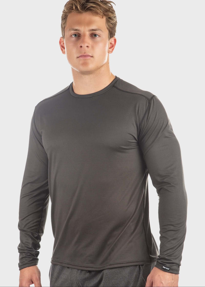 Experience all-day comfort with the Essential SoftTECH™ Shirt, designed for men who value lightweight, breathable wear. Featuring a relaxed fit, back yoke, and flat seams, this long sleeve tee moves with you while reducing irritation. Ideal for spring activities, it offers built-in UPF 50 protection to shield your skin from the sun’s harmful rays. Choose from multiple colors and enjoy quality you can trust—proudly made in the USA since 1990. Elevate your everyday wardrobe with this versatile essential.