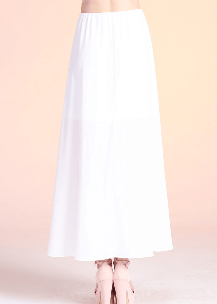 Elevate your everyday wardrobe with the Cascade High-Low Skirt in Ivory—a versatile piece that transitions seamlessly from casual to refined. Crafted from soft, lightweight satin washed twill, this maxi skirt drapes beautifully with a graceful cascading silhouette and striking high-low hem that flatters every stride. 