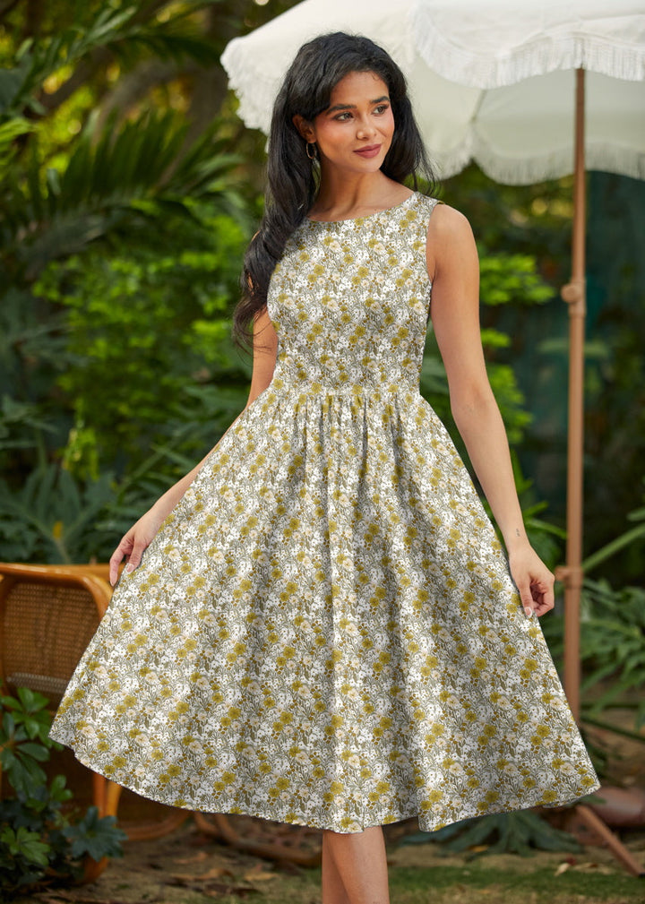 Made in USA. Shop the Mustard Floral cotton midi dress by Retrolicious, with a high neckline, full swing skirt and hidden pockets. Sizes XS–4X.