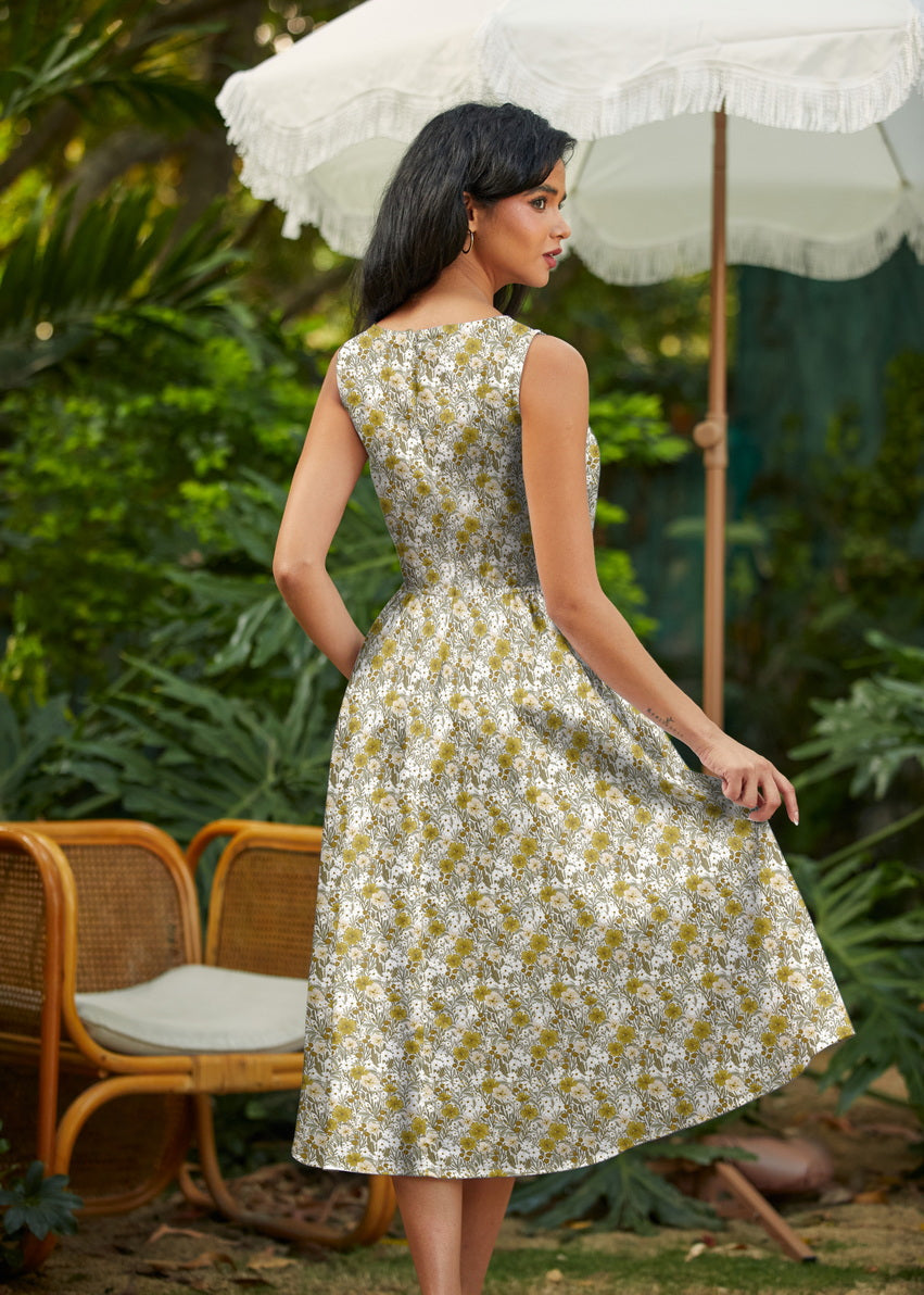 Made in USA. Shop the Mustard Floral cotton midi dress by Retrolicious, with a high neckline, full swing skirt and hidden pockets. Sizes XS–4X.