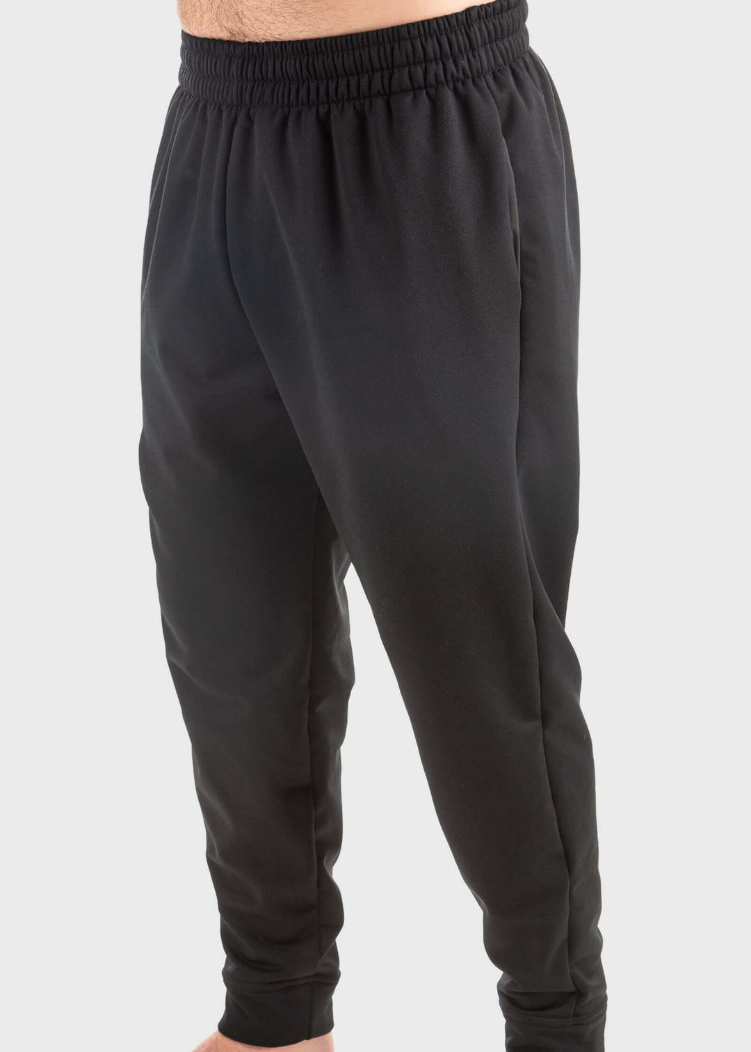 Experience unmatched comfort and durability with the Highland Fleece Sweatpant. Made from a cozy 14oz mid-weight fleece, these pants feature a brushed lining that keeps you warm during fall and perfect for layering in winter. Crafted from 99% cotton with a touch of spandex, they offer a loose fit with cuffs on the hem for a tailored feel. Convenient side pockets and an extra welt zippered pocket combine practicality with style. Proudly made in the USA since 1990, these sweatpants deliver warmth, functionali