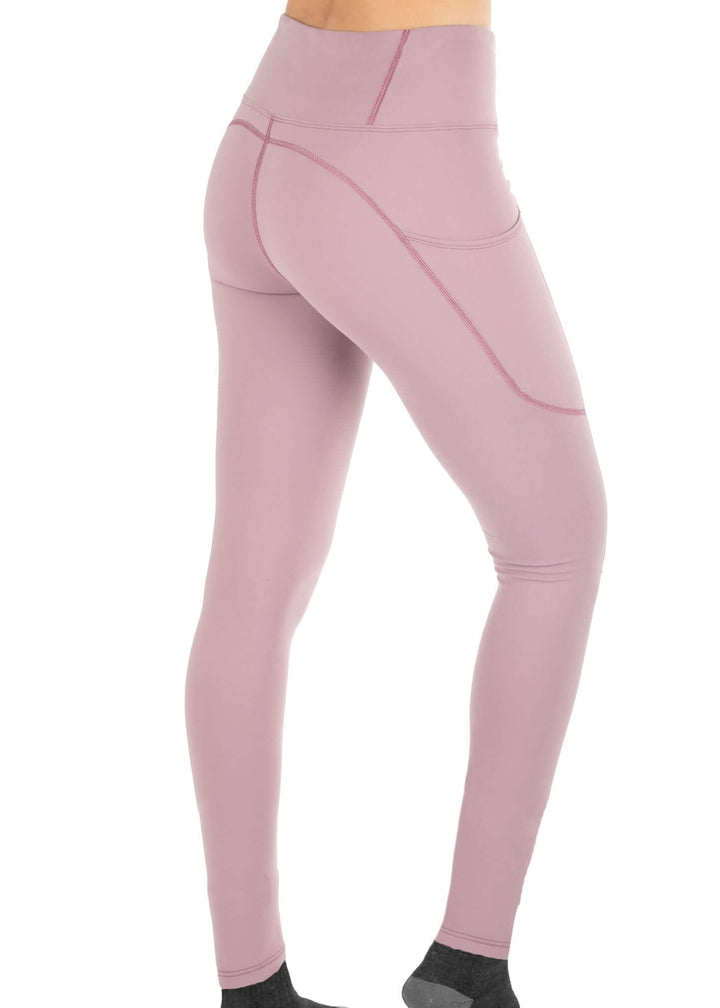 Experience ultimate comfort and functionality with the Hamptons Pocketed Legging. Designed with side pockets for easy storage, flat seams to prevent irritation, and no inner seam to enhance comfort while riding. Crafted from four-way stretch fabric, these leggings provide exceptional flexibility, durability, and a perfect fit for all-day wear.