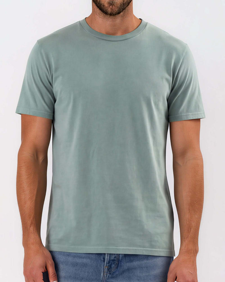 Made in USA Vintage Pigment Dyed Softest Tee - Fern: close-up front view of sage green tee showing crew neck and sleeves