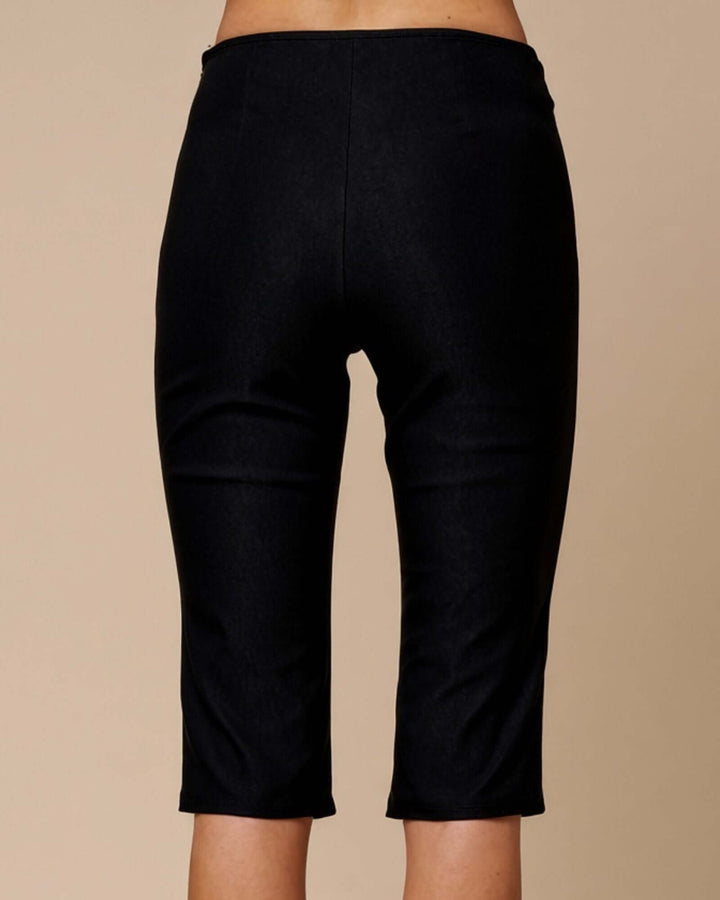 Made in USA black below-the-knee capri pants with side zipper and sleek fitted silhouette
