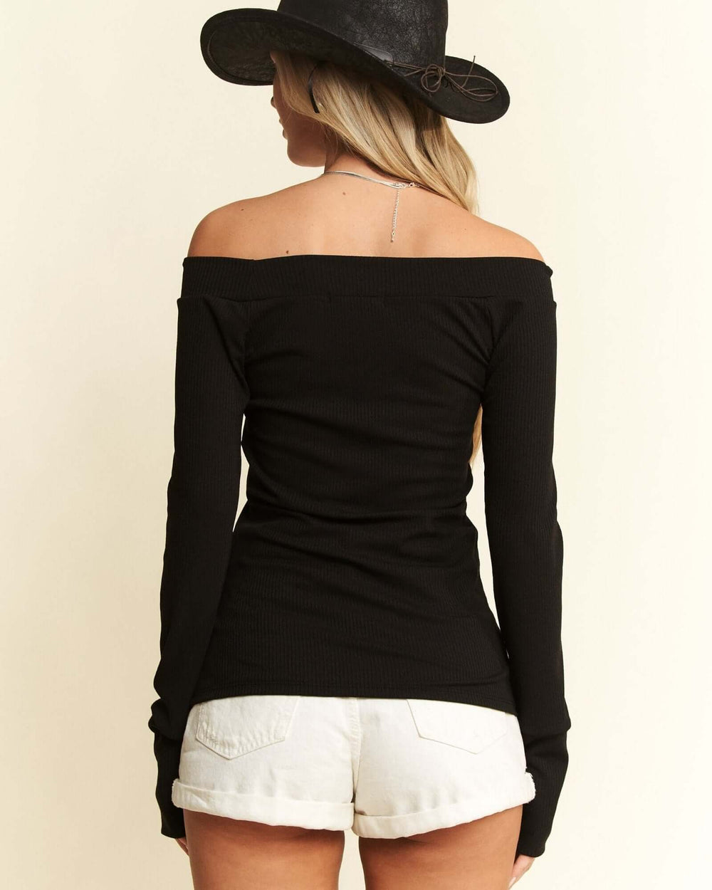 Made in USA women's black fitted off-the-shoulder long sleeve top with thumbholes, back view