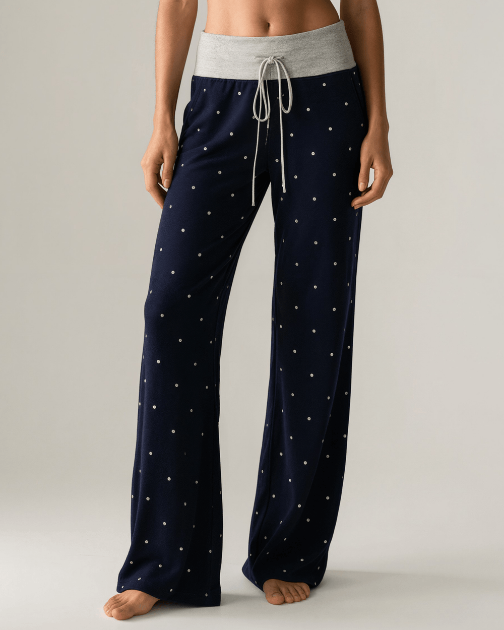 Made in USA. Women's super cute and cozy polka dot relaxed fit pajama pants in sage or navy with drawstring 78% Polyester, 18% Rayon, 4% Spandex. S-XL.