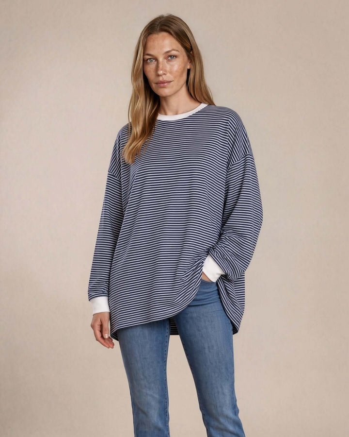 Made in USA Sunday Stroll Loose Fit Stripe Tunic - Navy: front view with hand in pocket, tunic length over jeans