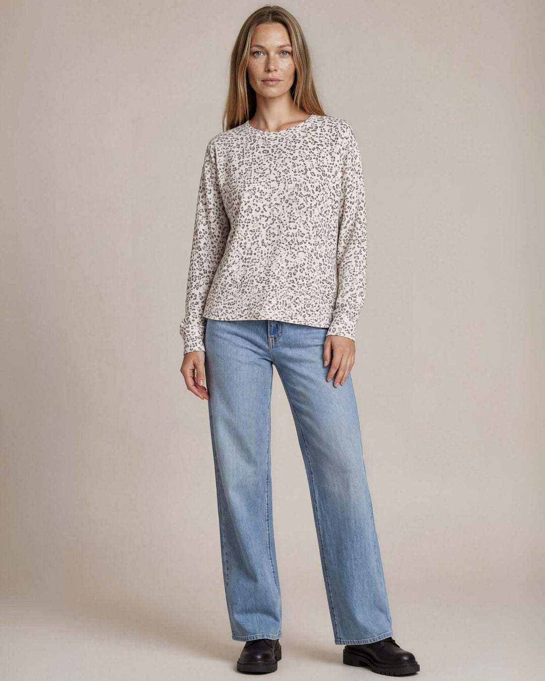 Made in USA Amelia Animal Print Oversized Sweatshirt: full-length front view untucked with wide leg jeans