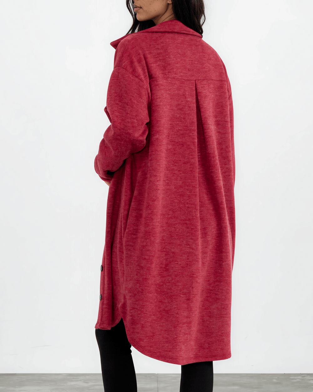 Made in USA. Layer the women's Linden longline shacket in Burgundy Red. Relaxed button-down style with soft feel, side pockets and a high-low hem.