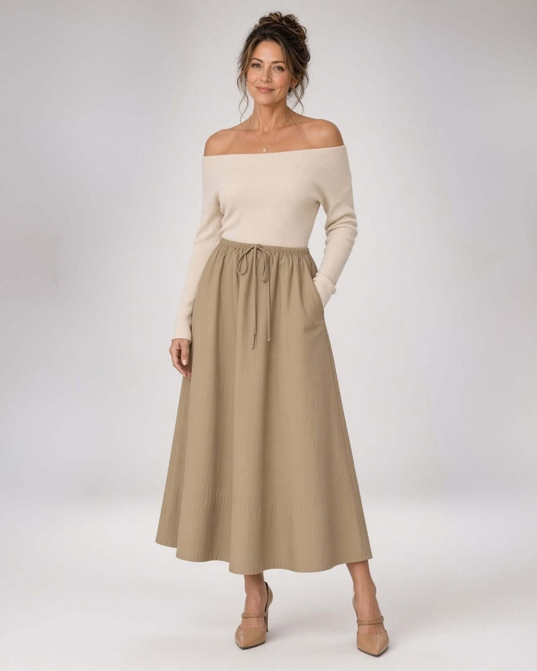 Made in USA. Discover a khaki 100% cotton poplin maxi skirt with a gathered drawstring waist and graceful, flowy silhouette. Sizes S–L.