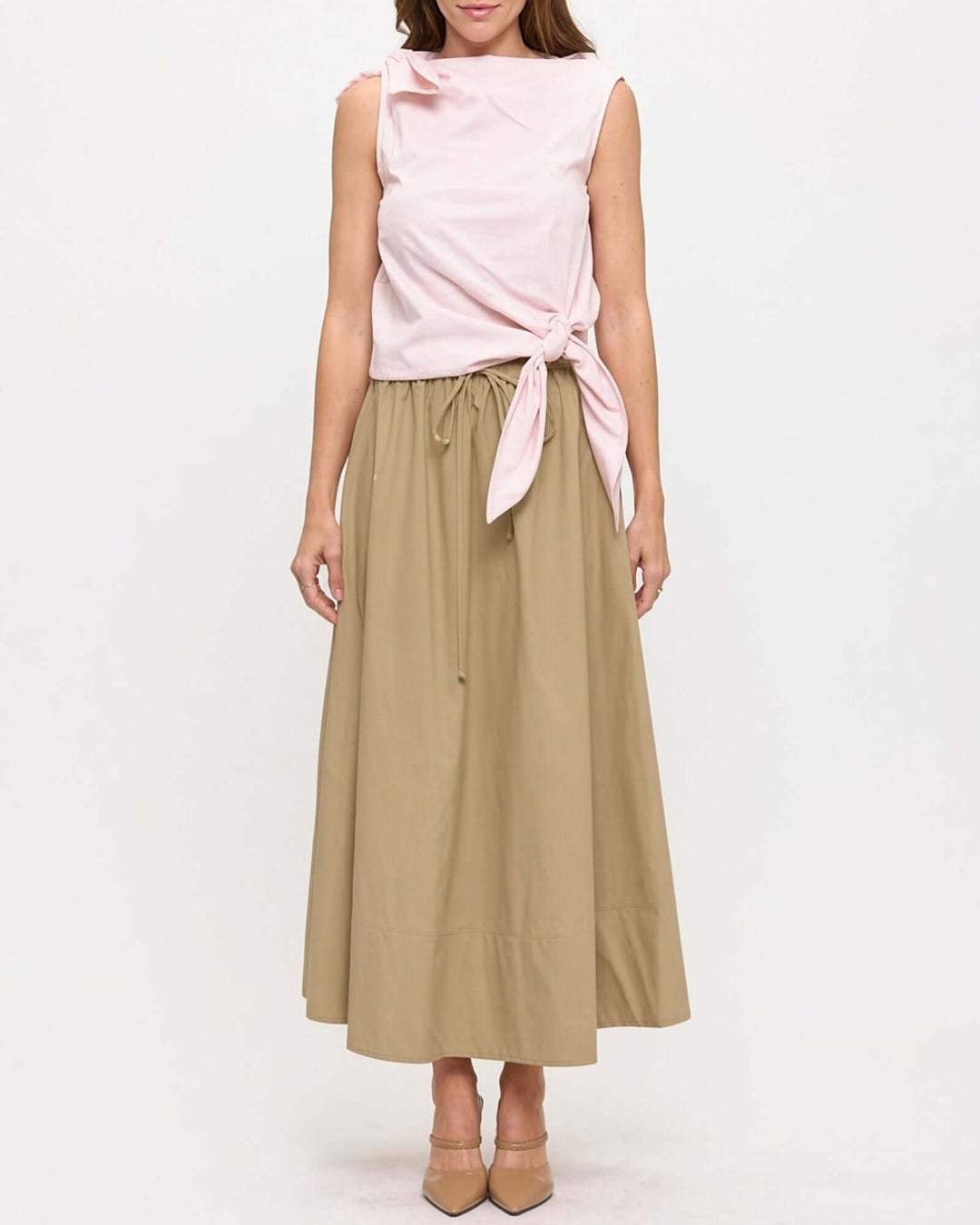 Made in USA. Discover a khaki 100% cotton poplin maxi skirt with a gathered drawstring waist and graceful, flowy silhouette. Sizes S–L.