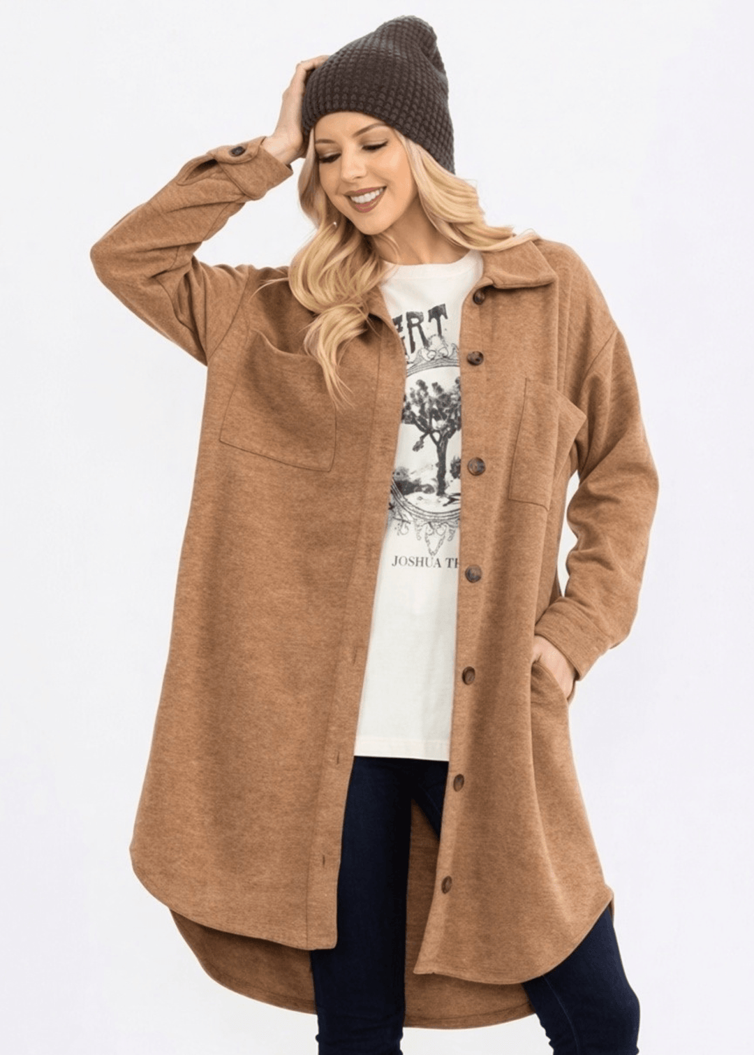 Made in USA. Layer the women's Linden longline shacket in Camel. Relaxed button-down style with soft feel, side pockets and a high-low hem.