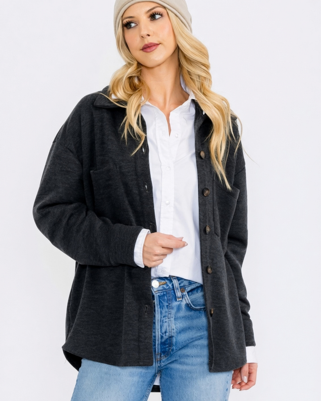 Made in USA button-down shacket with a relaxed fit, side pockets, and a medium-weight feel. Layer in Charcoal Black or Olive, sizes S–L
