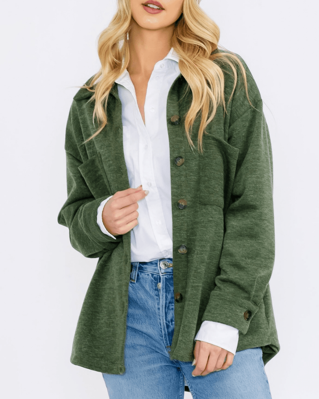 Made in USA button-down shacket with a relaxed fit, side pockets, and a medium-weight feel. Layer in Charcoal Black or Olive, sizes S–L