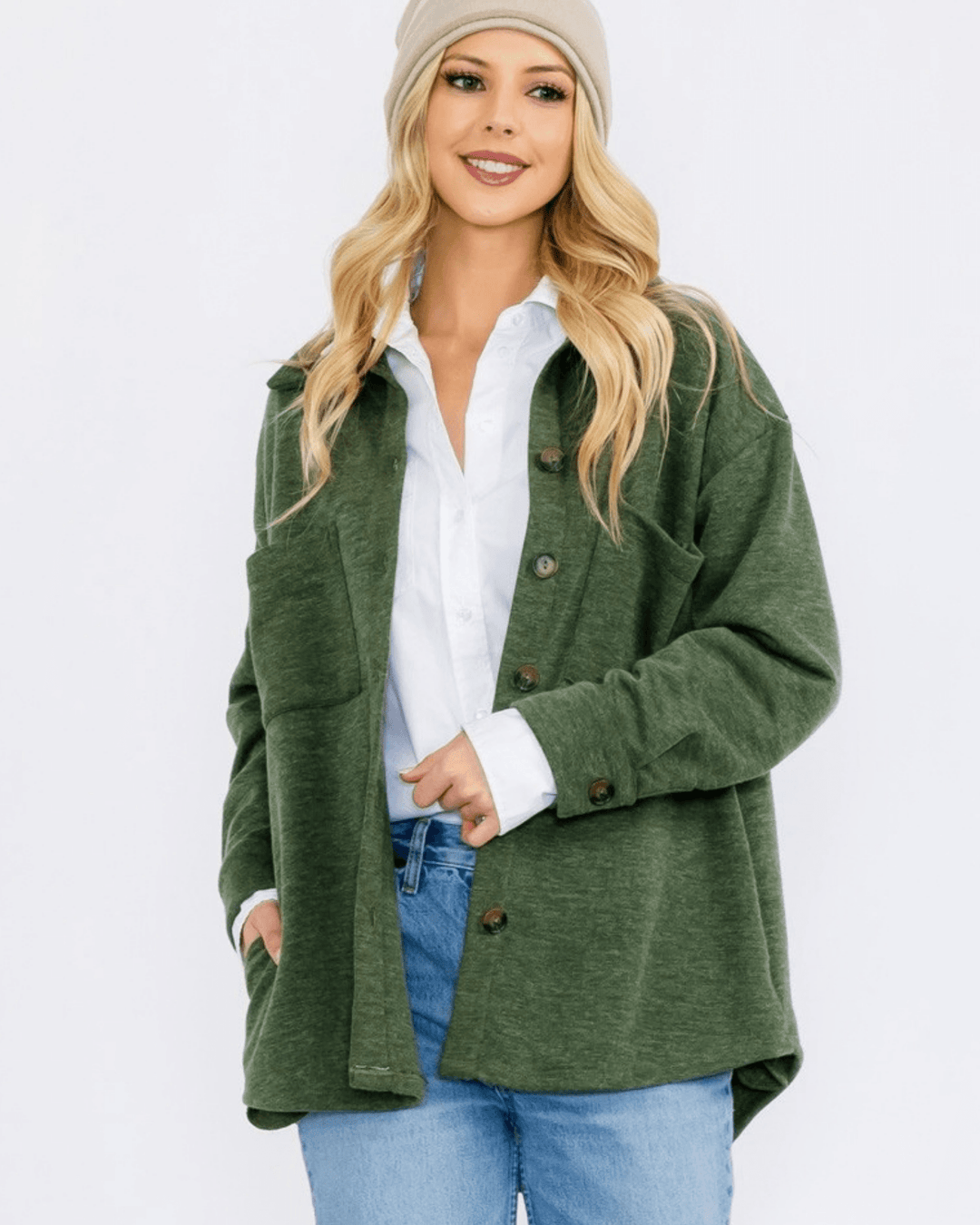 Made in USA button-down shacket with a relaxed fit, side pockets, and a medium-weight feel. Layer in Charcoal Black or Olive, sizes S–L