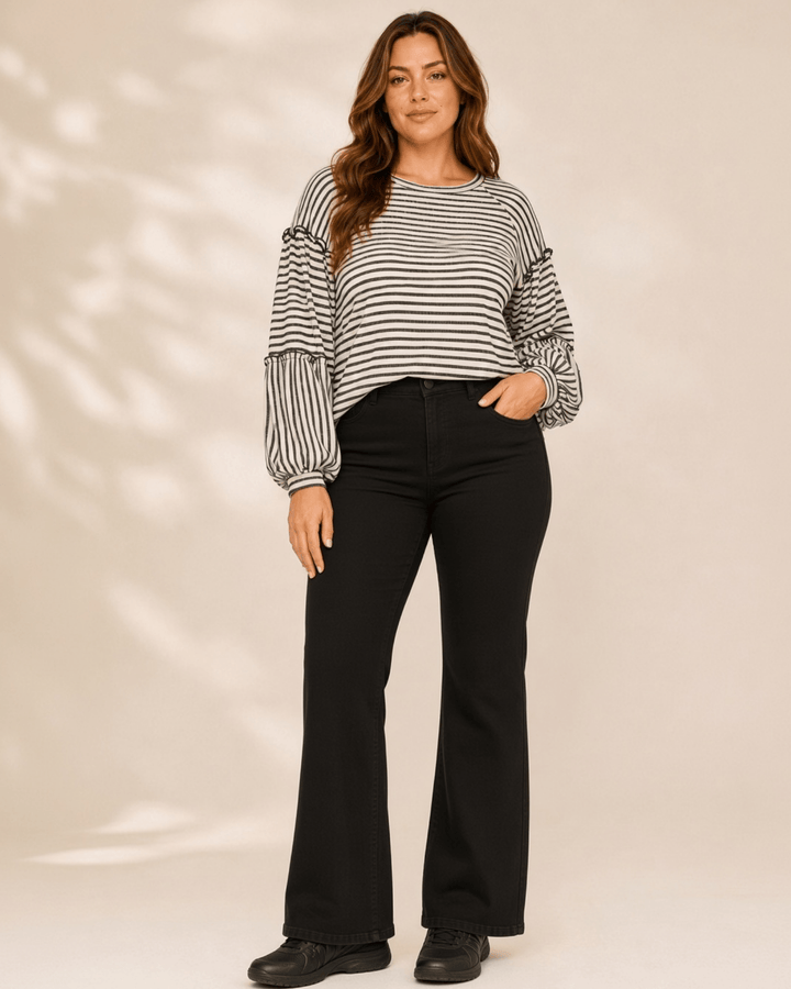 Made in USA. Tori textured striped top features stretch knit, tiered bubble sleeves and delicate ruffle trim. An easy everyday style in regular and plus sizes.