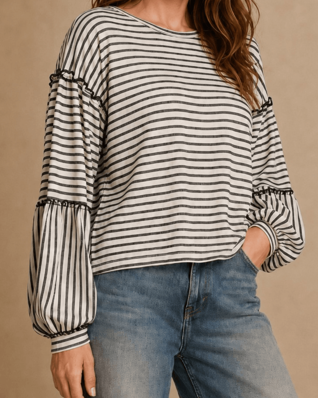 Made in USA. Tori textured striped top features stretch knit, tiered bubble sleeves and delicate ruffle trim. An easy everyday style in regular and plus sizes.
