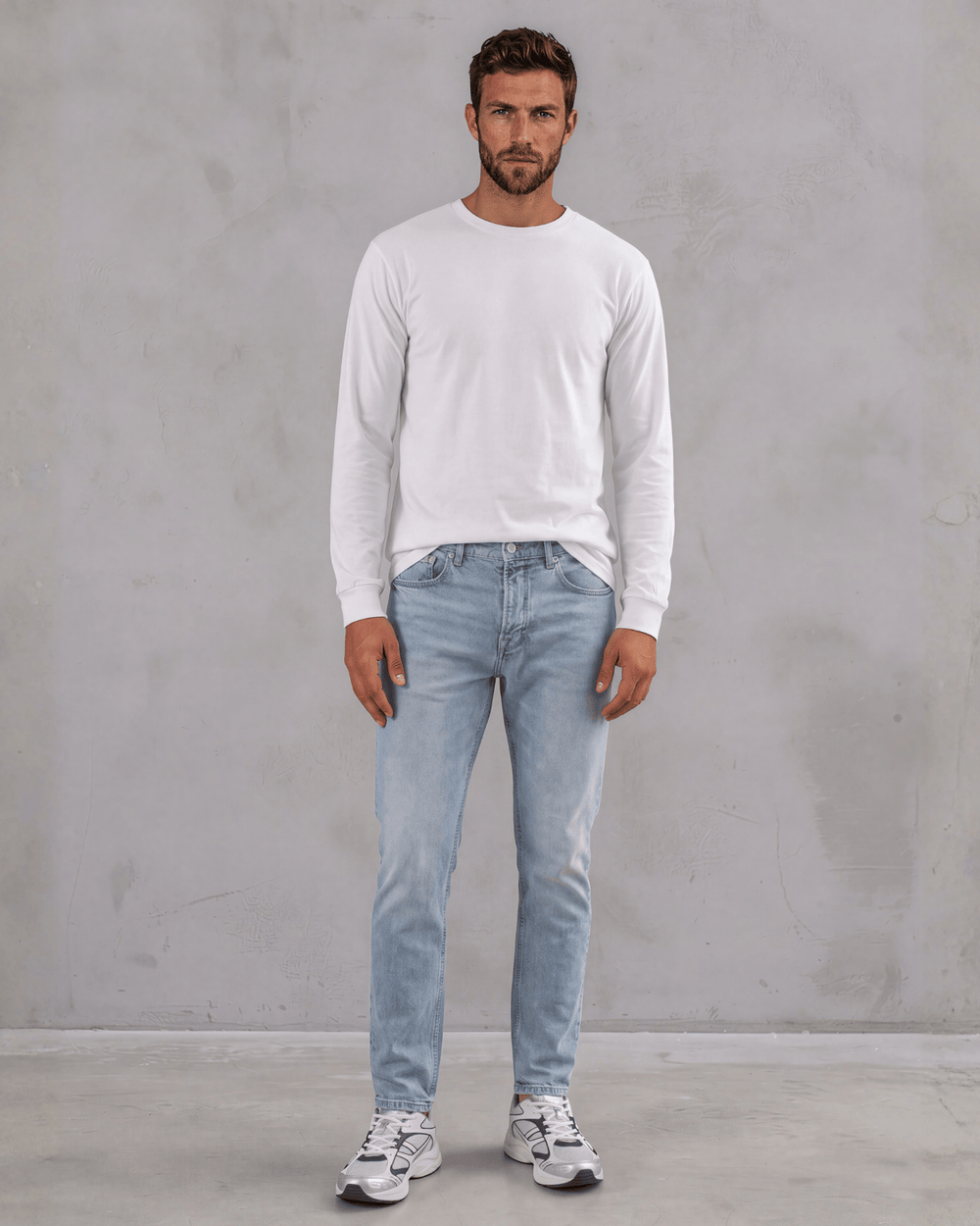 Men's long sleeve crew neck tee made in USA with 100% pre-shrunk cotton. Available in Black, White & Navy. Medium weight, ribbed cuff.