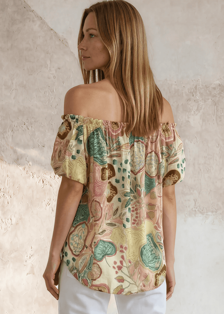 Shop the Avery Floral Off-Shoulder Puff Sleeve Top — lightweight cotton-rayon blend, pastel floral print, relaxed fit. Made in USA.