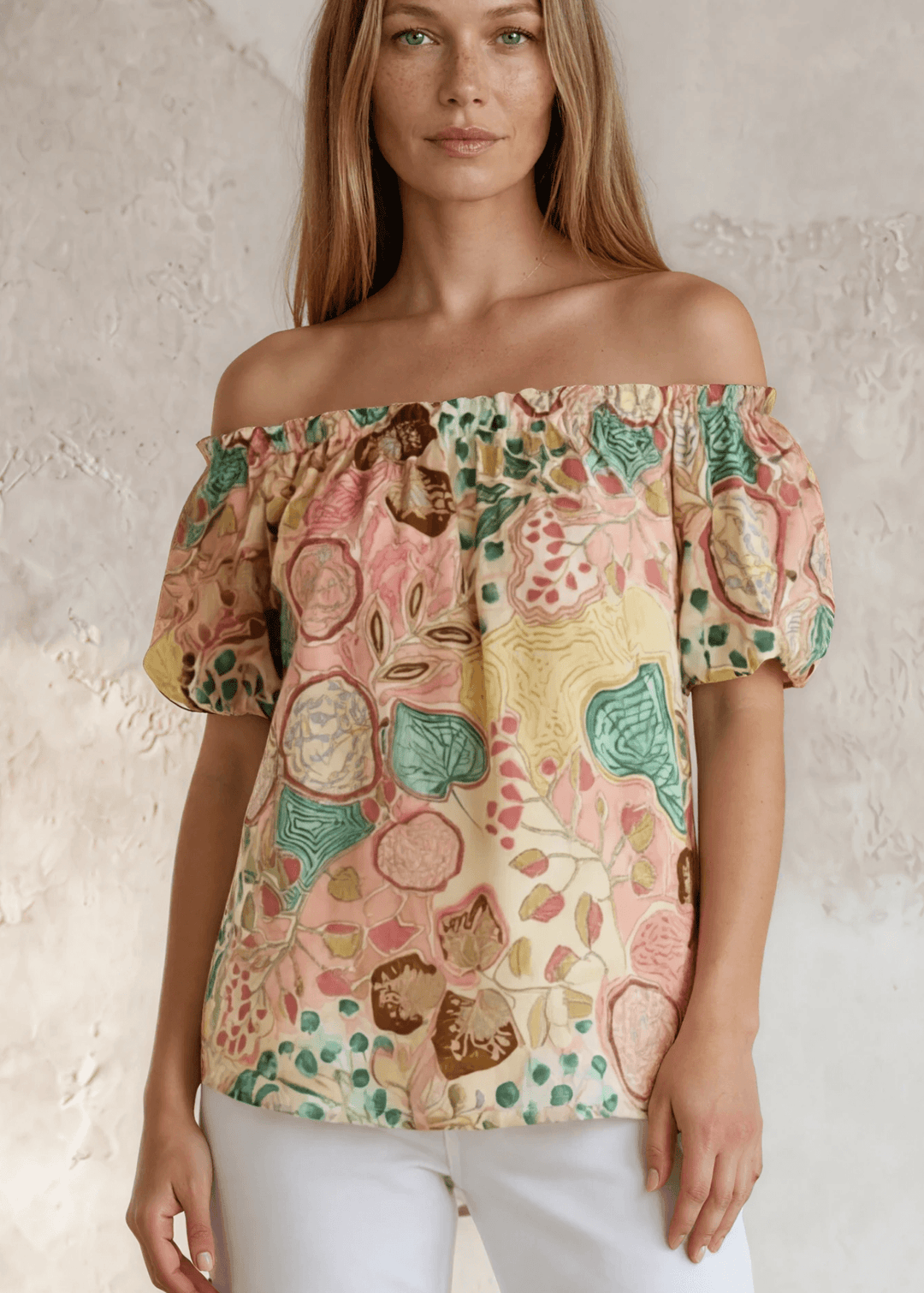 Shop the Avery Floral Off-Shoulder Puff Sleeve Top — lightweight cotton-rayon blend, pastel floral print, relaxed fit. Made in USA.