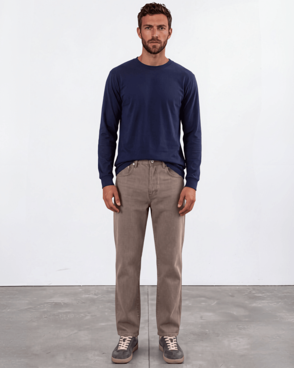 Men's long sleeve crew neck tee made in USA with 100% pre-shrunk cotton. Available in Black, White & Navy. Medium weight, ribbed cuff.