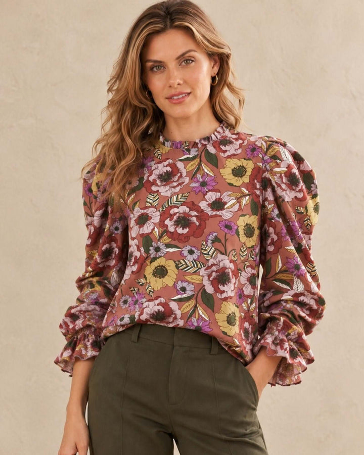 Made in USA Veronica Vintage Floral Puff Sleeve Blouse: three-quarter front view tucked into olive pants