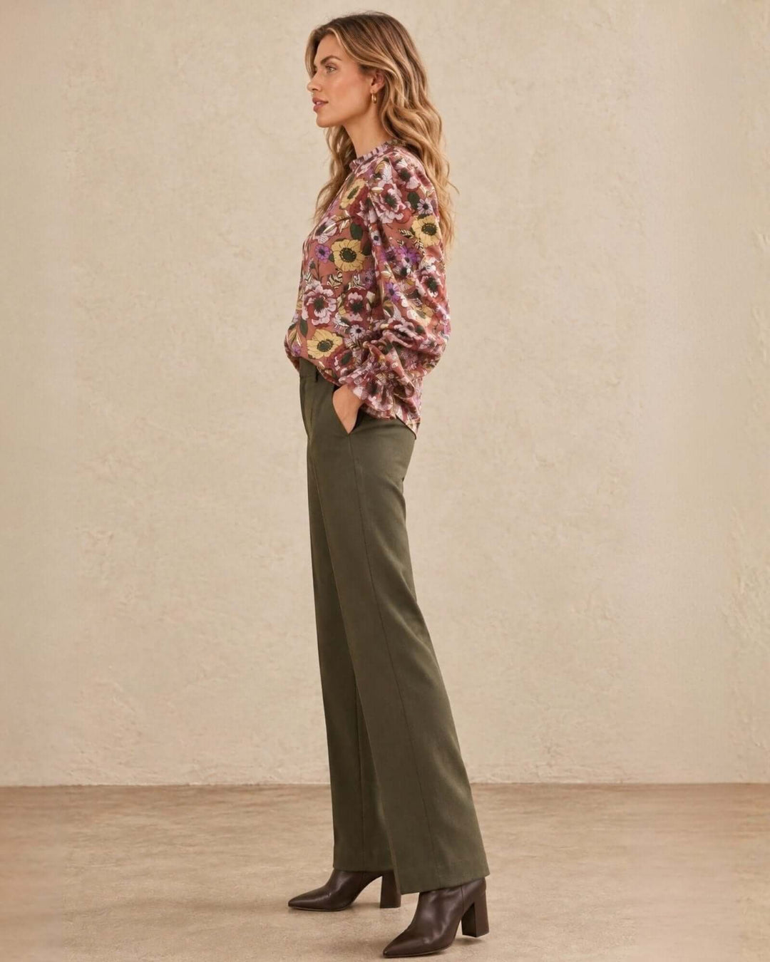 Made in USA Veronica Vintage Floral Puff Sleeve Blouse: full-length side view with olive pants and boots