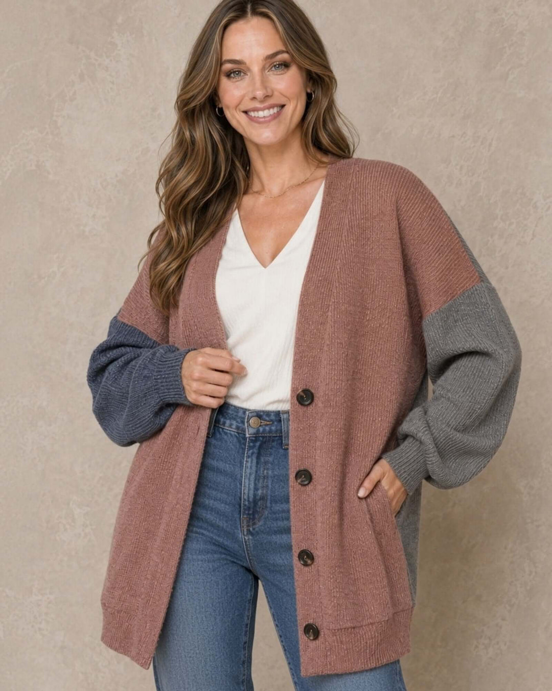 Made in USA Katie Color Block Cardigan: smiling model holding open front over white V-neck and jeans