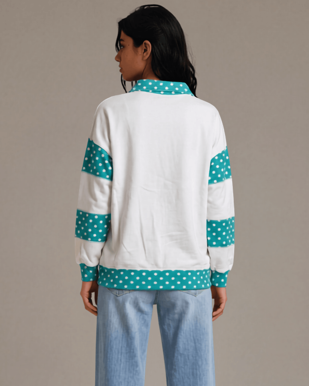 Made in USA. White French terry pullover with teal polka dot contrast collar, sleeves &amp; hem. Open V-neck, relaxed fit. 95% cotton. Sizes S–L.