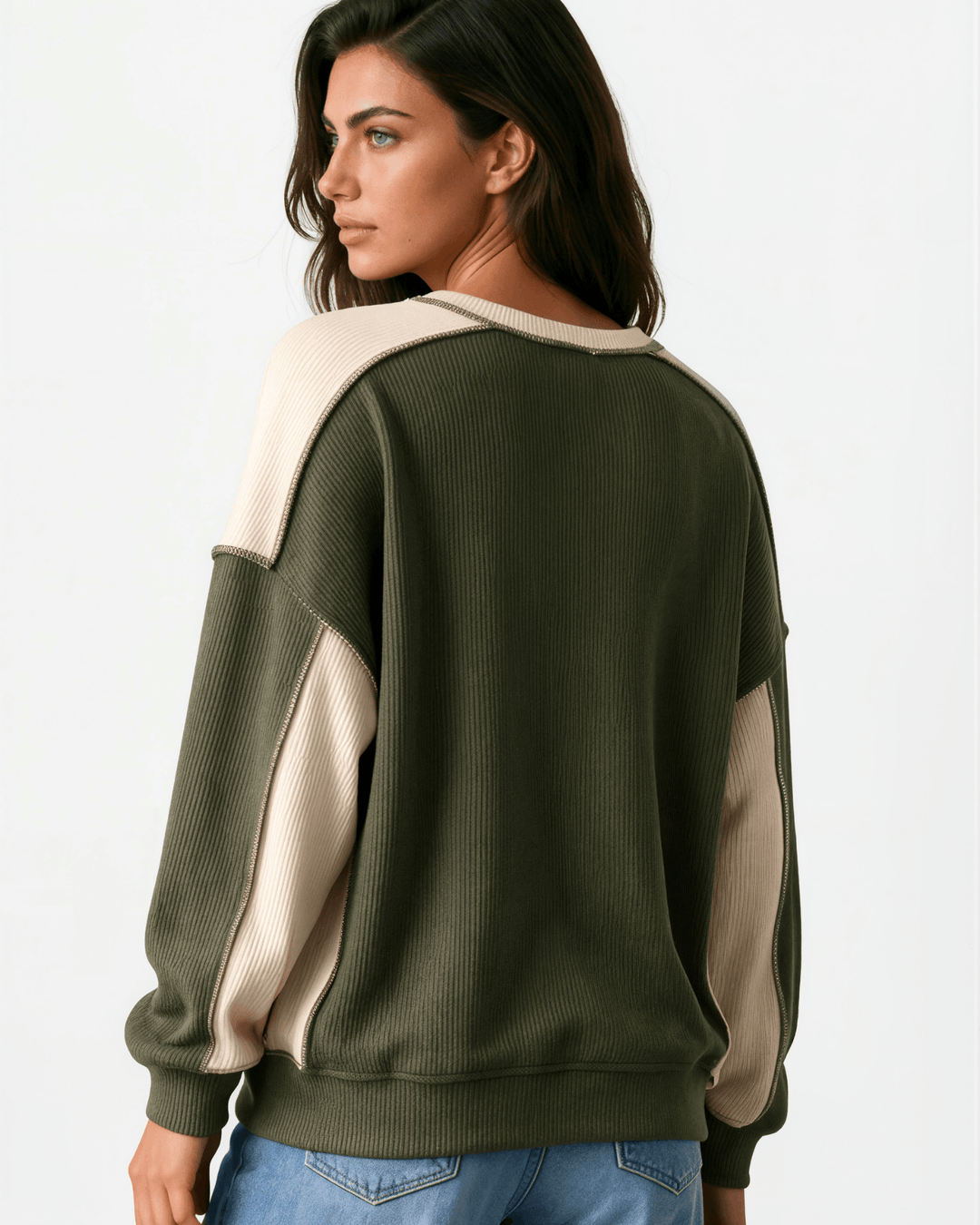 Made in USA. Olive &amp; cream color block ribbed knit sweatshirt. Notched neck, exposed seams, oversized fit. 97% polyester. Sizes S–XL.