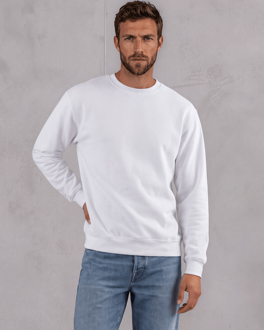 Men's long sleeve fleece sweatshirt made in USA with USA milled fabric. 9.5 oz, 80% cotton/20% polyester, crew neck, relaxed fit. White or Heather Gray.