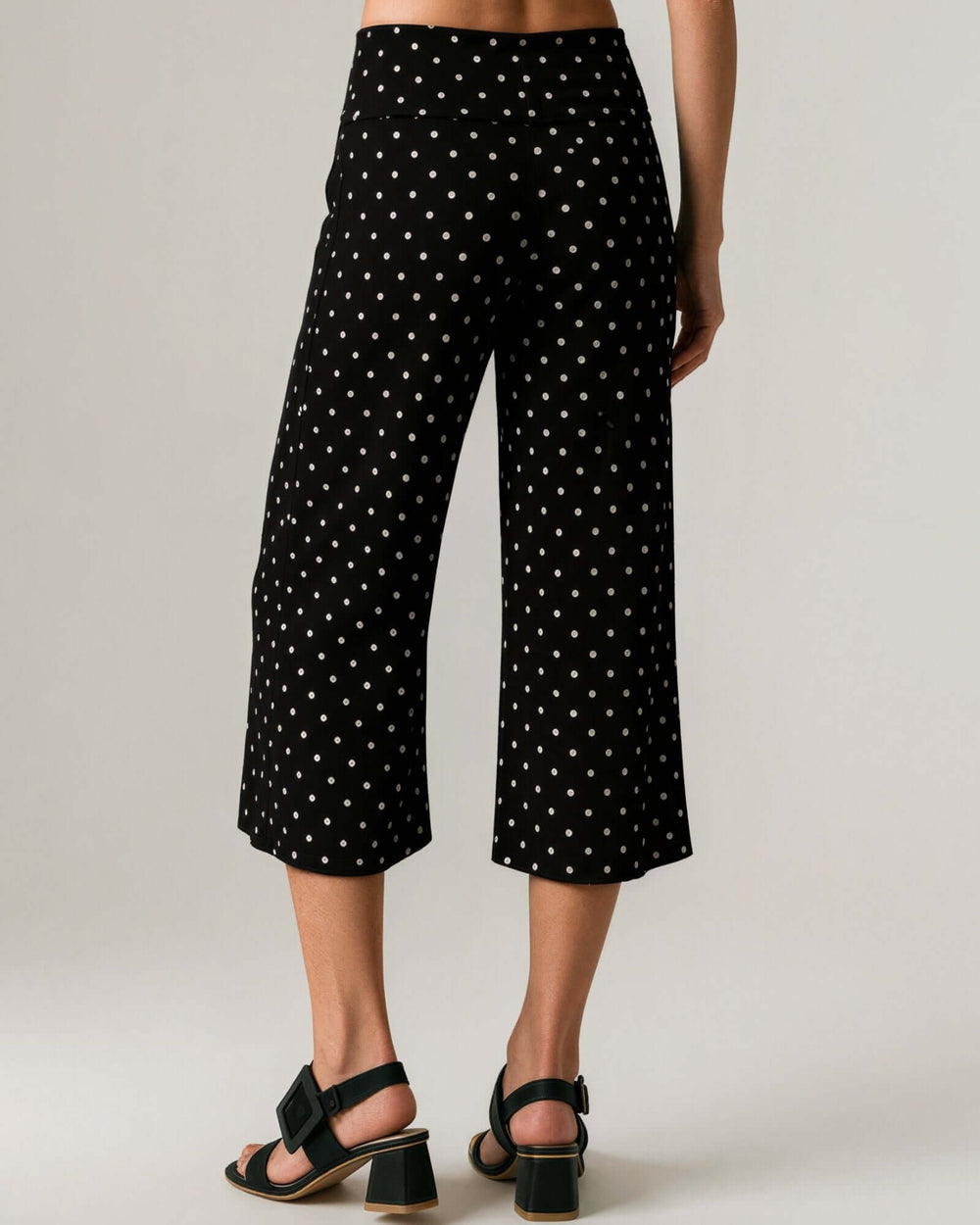 Made in USA women's black and white polka dot cropped wide-leg gaucho pants with fold-over waistband, back view
