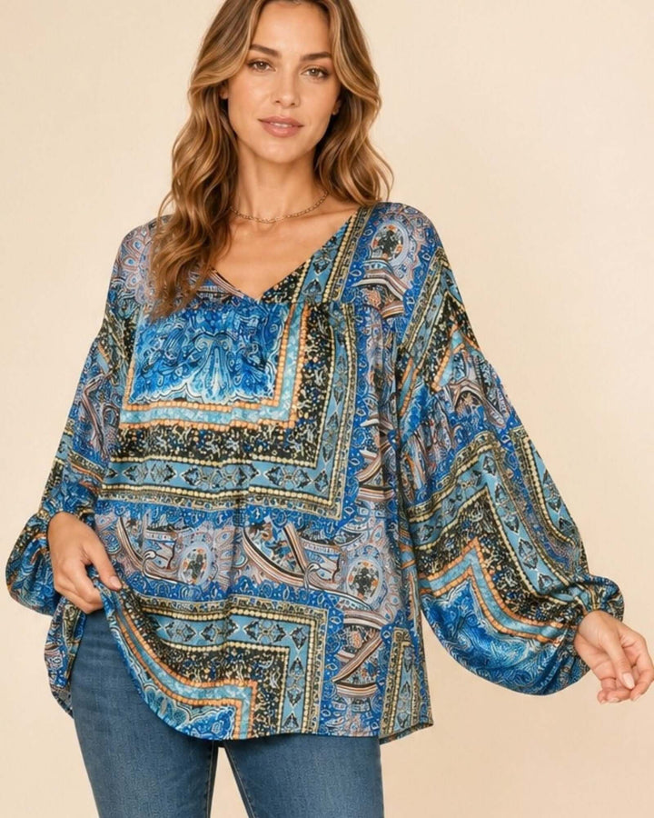 Made in USA Bella Balloon Sleeve Blouse: front view of flowy fit and teal scarf print with jeans