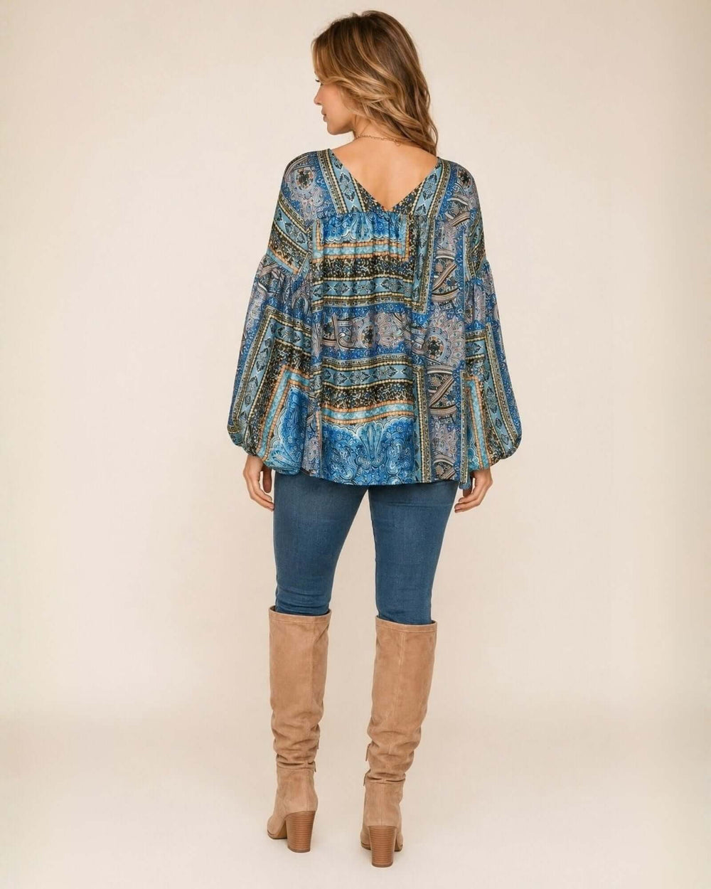 Made in USA Bella Balloon Sleeve Blouse: full-length back view with jeans and tan knee-high boots