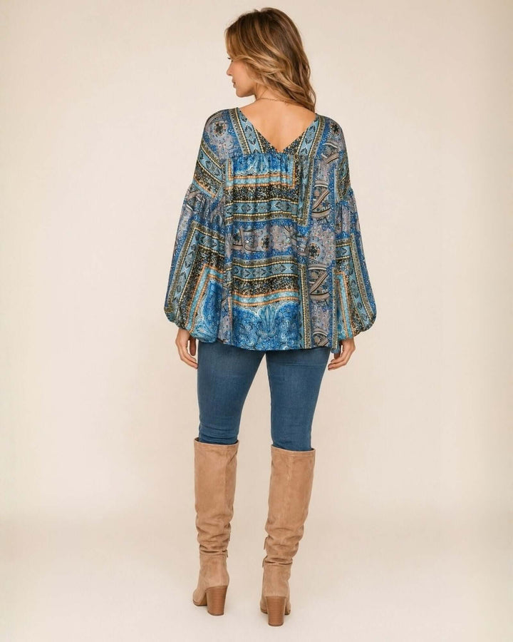 Made in USA Bella Balloon Sleeve Blouse: full-length back view with jeans and tan knee-high boots