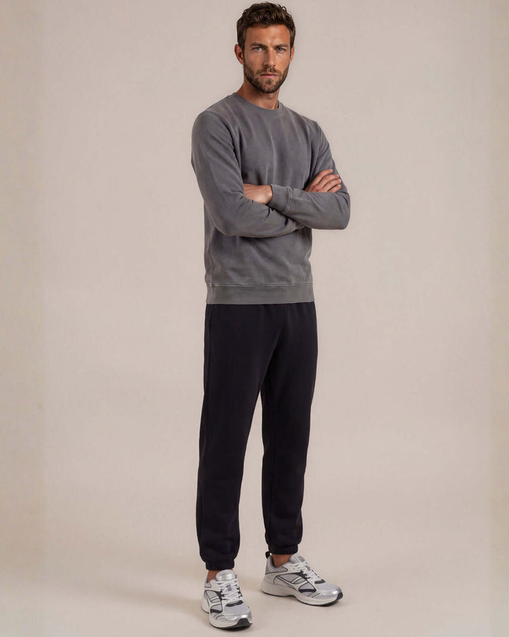 Made in USA vintage pigment dyed fleece crew sweatshirt in Charcoal with ribbed crew neck, cuffs, and hem