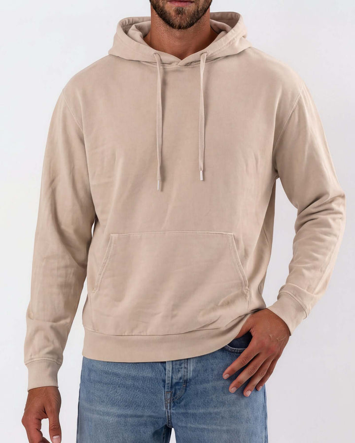 Made in USA vintage pigment dyed fleece pullover hoodie in Khaki with drawstring hood, front pouch pocket, and ribbed cuffs and hem - front view