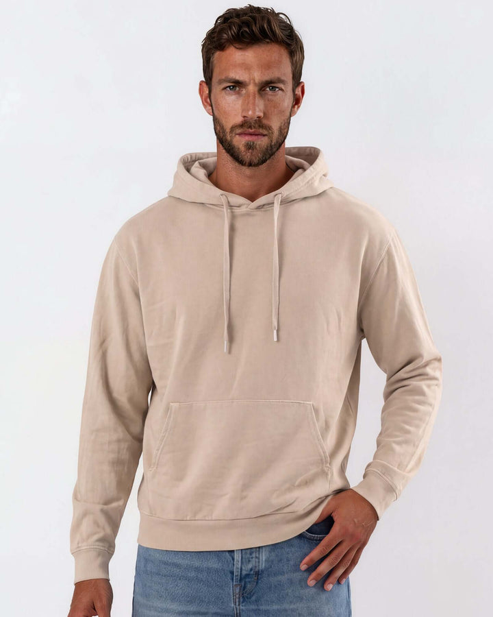 Made in USA vintage pigment dyed fleece pullover hoodie in Khaki with drawstring hood, front pouch pocket, and ribbed cuffs and hem